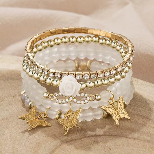white and gold bracelet set